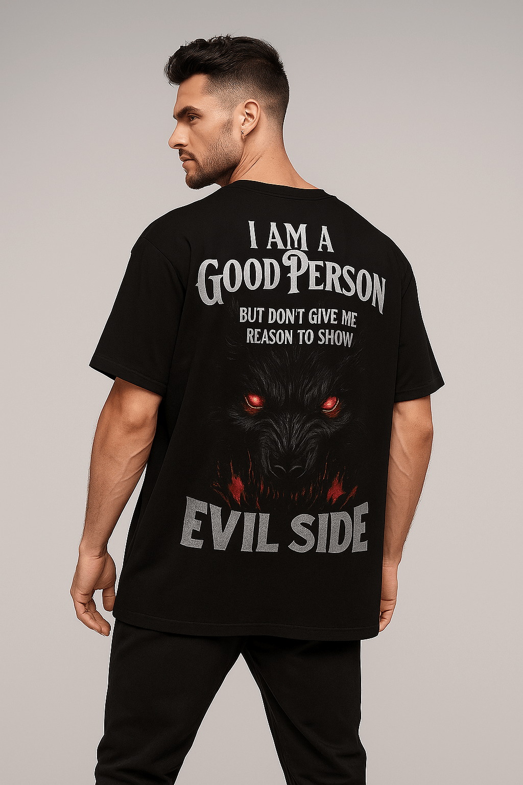 Oversized black T-shirt with large wolf face and “Good Person Evil Side” quote on the back, unisex streetwear.