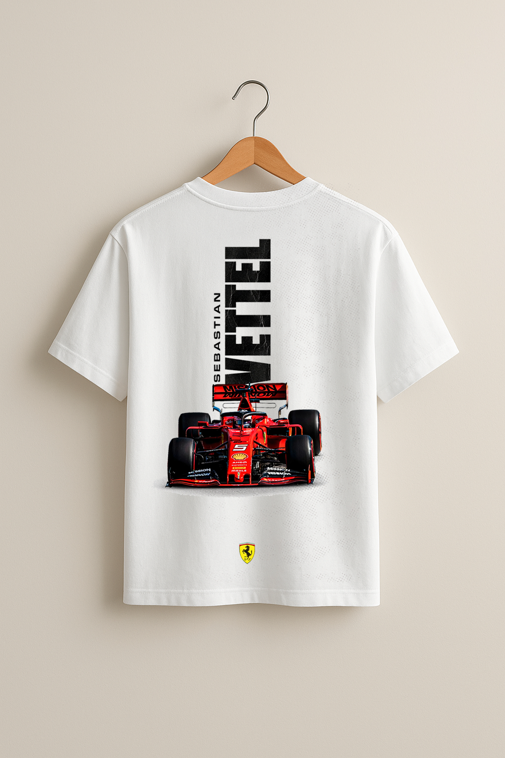 White t-shirt with Formula 1 car graphic and 'Sebastian Vettel' text on a beige background