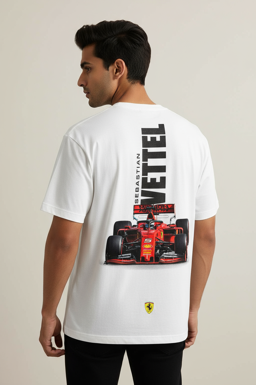 Person wearing a white t-shirt with a red racing car graphic and Ferrari logo on the back.