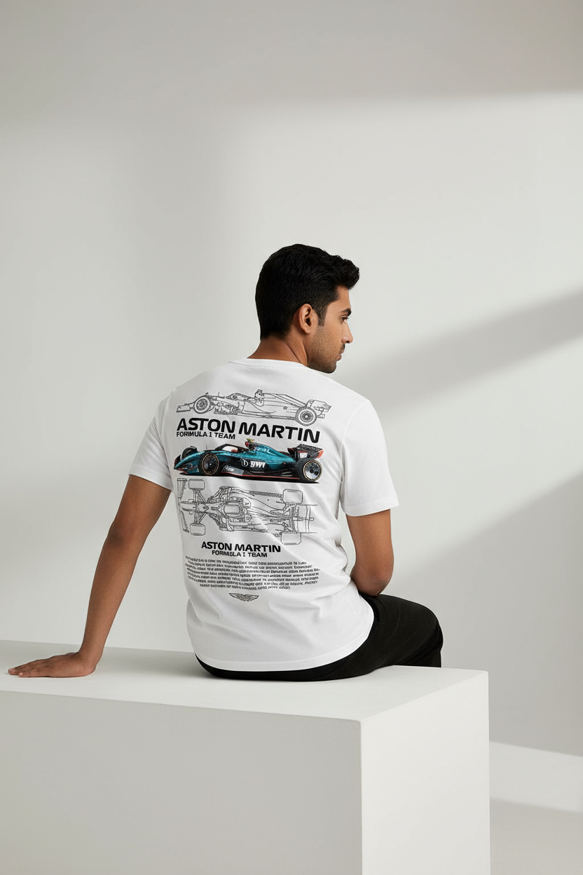 Person wearing a white t-shirt with Aston Martin logo and car design on a white background